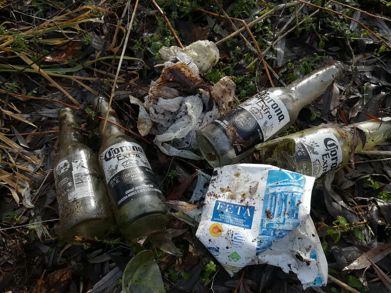 Two full bags of garbage collected from a river in Germany