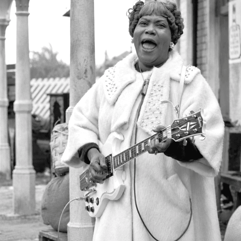In a segregated America, she toured with her own bus, her own sound, and a guitar that rew