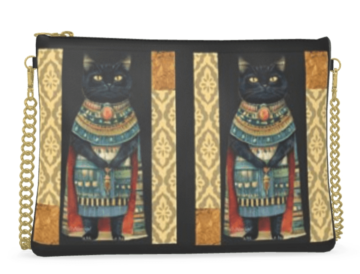 Egyptian cat black crossbody leather bag gold chain by &copy; Navig&eacute;
