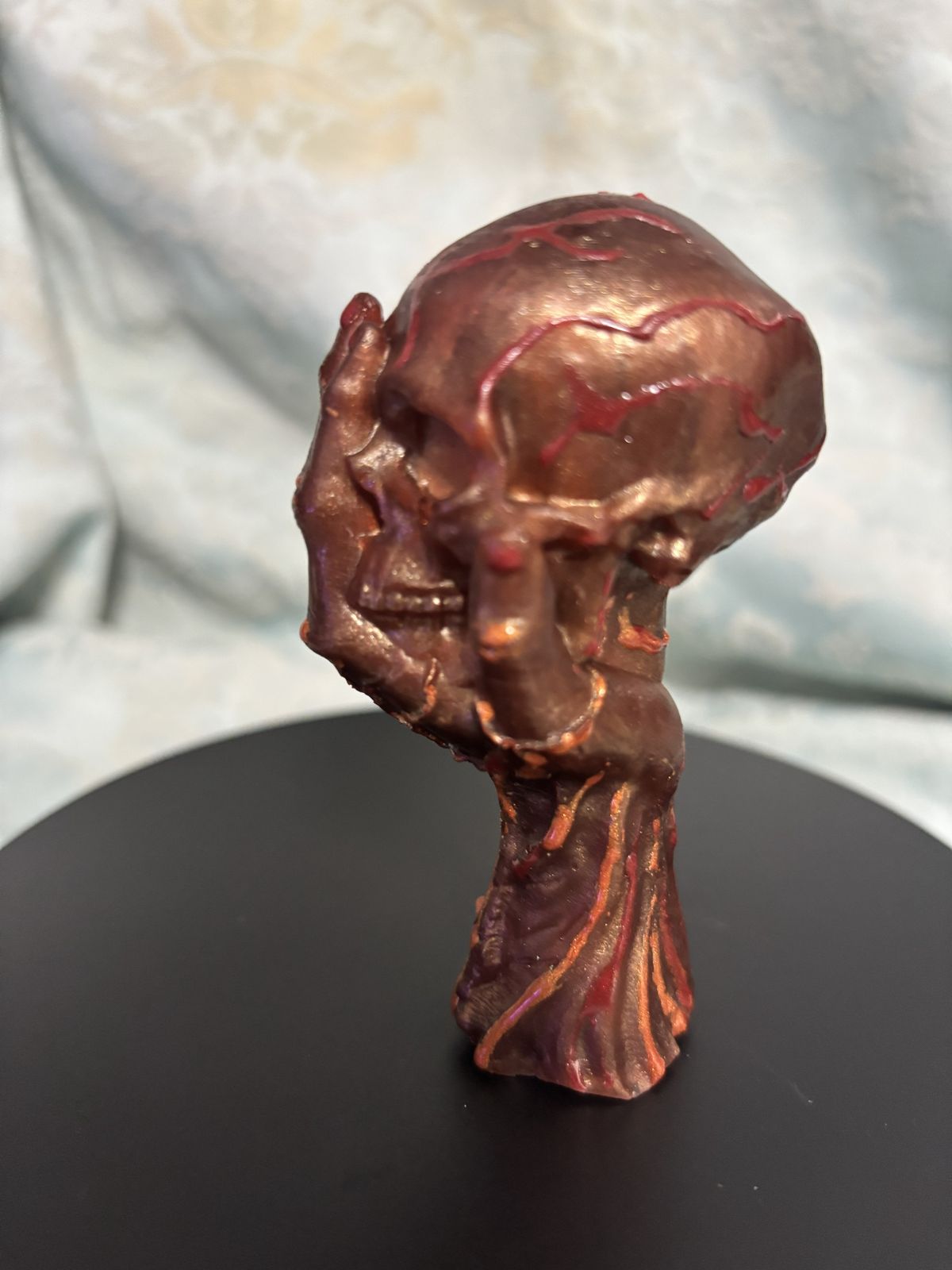 Skull with hand