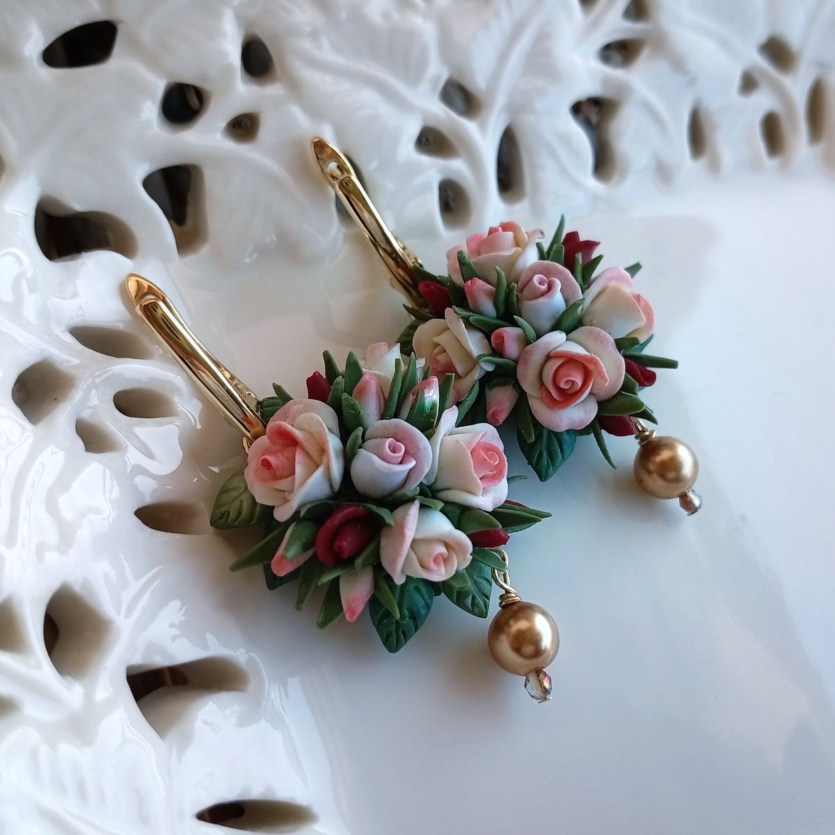 Handmade rose earrings with gold-plated findings and a Swarovski bead. Beautifully gift-wrapped and shipped worldwide for free